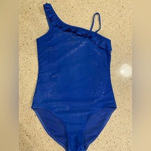 A blue swimsuit with sparkles and a cute design.